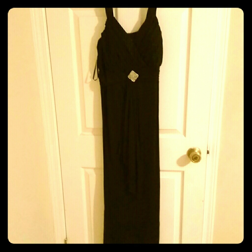 B. Smart black knee length dress.